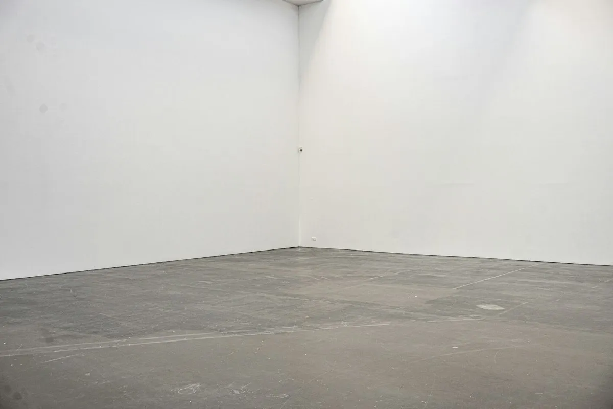 Bare shell: an empty room with bare walls and a concrete floor